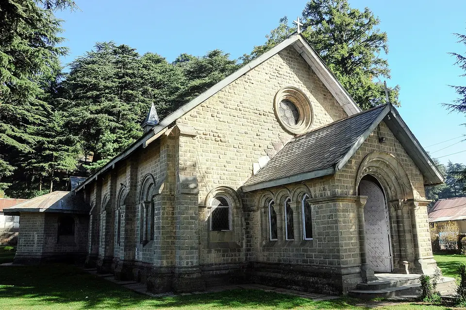 St John's Church in Dalhousie, a grey stone church among deodars