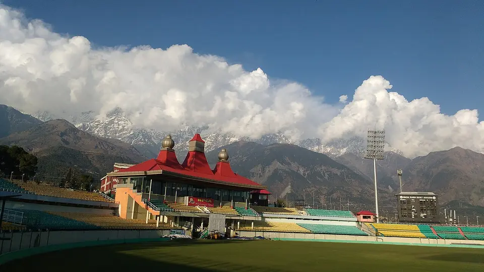 The HPCA cricket stadium in Dharamshala, with the snow-capped Dhauladhar range behind it