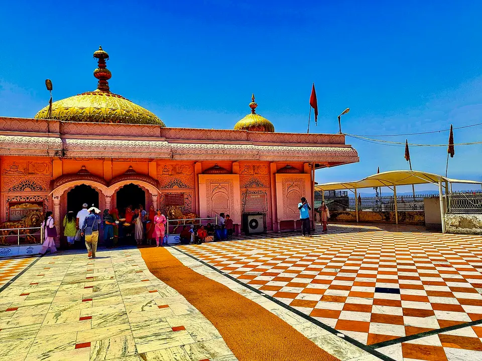 The Jwalamukhi temple at Jwala Ji, its gilded domes over a chequered courtyard
