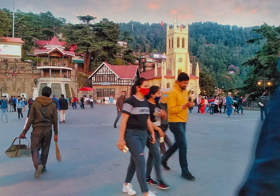 Christ Church and the Ridge in Shimla, with people out walking in the evening